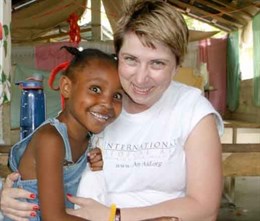 Tiffany makes a friend in Haiti